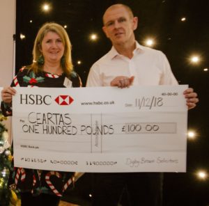 Helen receiving check as example of other fundraising