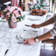 image of woman setting table for dinner