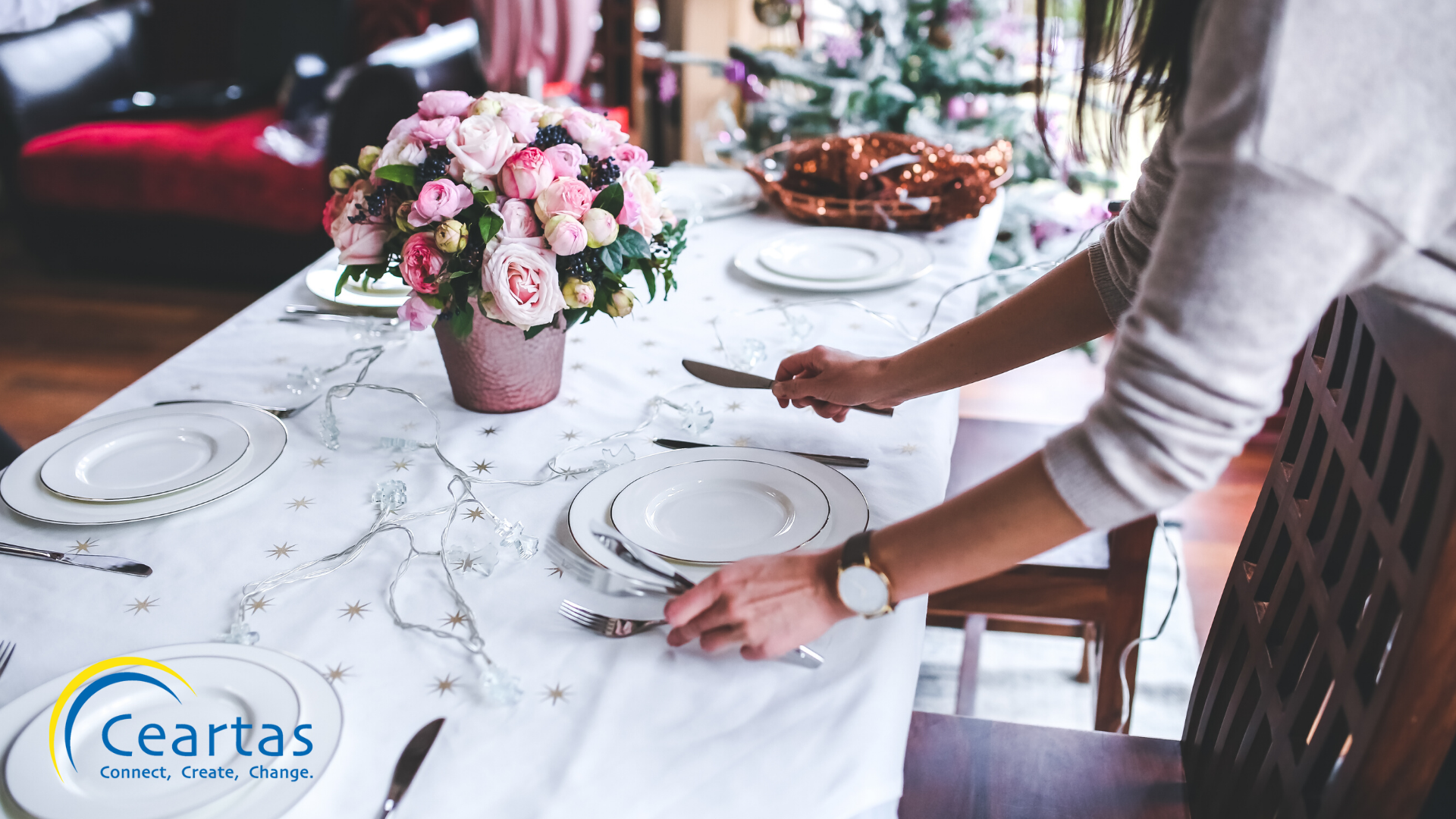 image of woman setting table for dinner