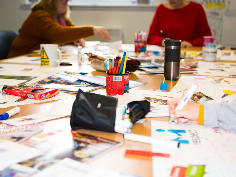 arts and craft on table in meeting room