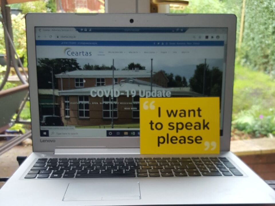Laptop with Ceartas site and dementia leaflet